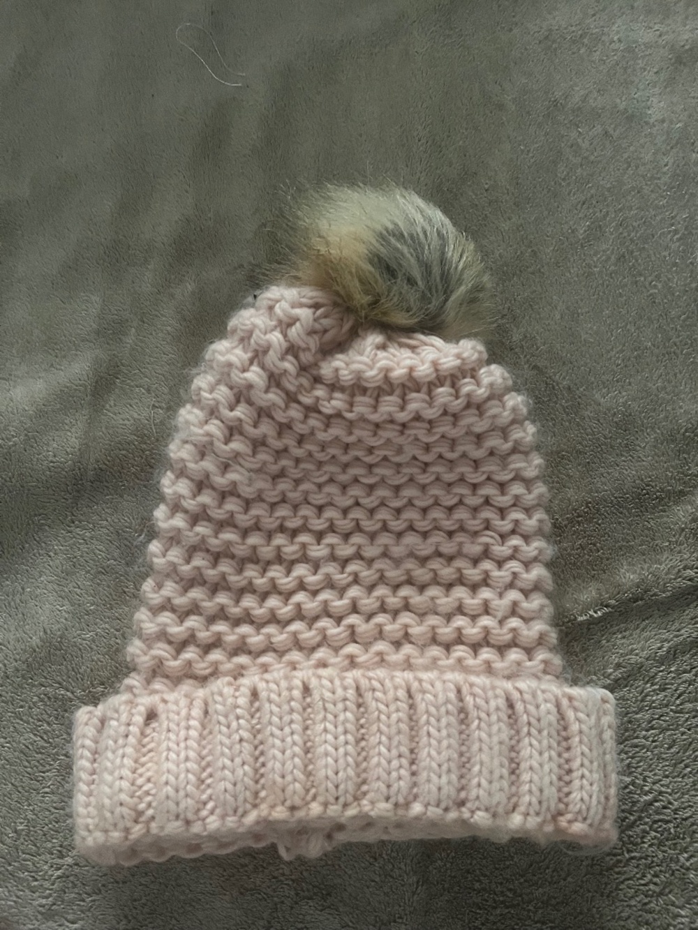 Pink knit winter hat fur pom pom